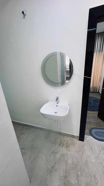 Bathroom in 4 BHK Apartment at Rajapushpa Infina, Manchirevula – for Sale