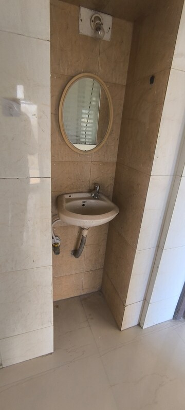 Bathroom in 2 BHK Apartment at Dynamix Avanya, Dahisar East – for Rent
