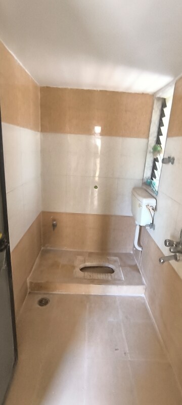Bathroom in 2 BHK Apartment at Dynamix Avanya, Dahisar East – for Rent