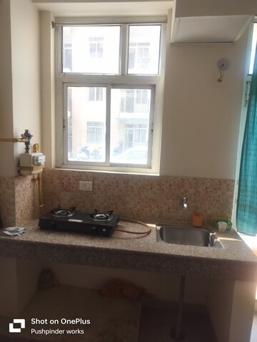 Living Room in 1 BHK Apartment at Wave City, Wave City – for Rent