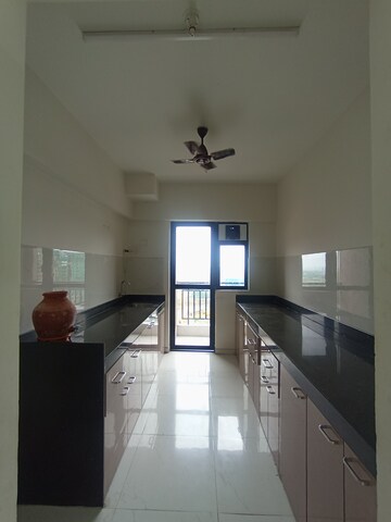 Kitchen in 3 BHK Apartment at Runwal Gardens, Dombivli East – for Rent