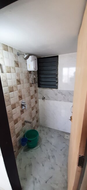 Bathroom in 2 BHK Apartment at K Raheja Heights, Malad East – for Sale