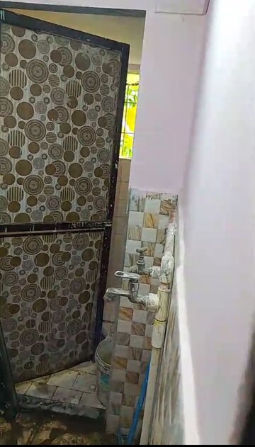 Bathroom in 1 RK Apartment at Sarthak Society, Kalwa – for Rent