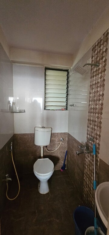 Bathroom in 2 BHK Apartment at Sunshine Willows, Ghansoli – for Rent