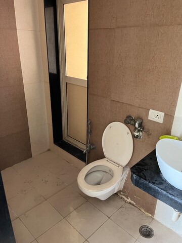 Bathroom in 2 BHK Apartment at Rustomjee Urbania Astraea, Majiwada – for Rent