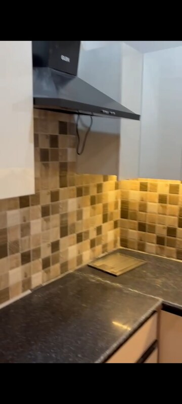 Kitchen in 1.5 BHK Apartment at Prateek Grand Carnesia, Siddharth Vihar – for Rent