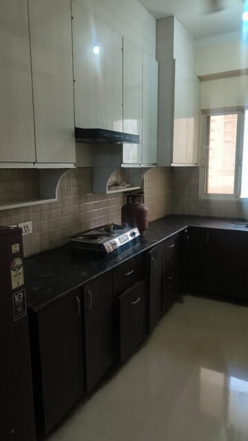 Kitchen in 3 BHK Apartment at Aims Golf City, Sector 75 – for Sale