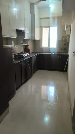 Kitchen in 3 BHK Apartment at Aims Golf City, Sector 75 – for Sale