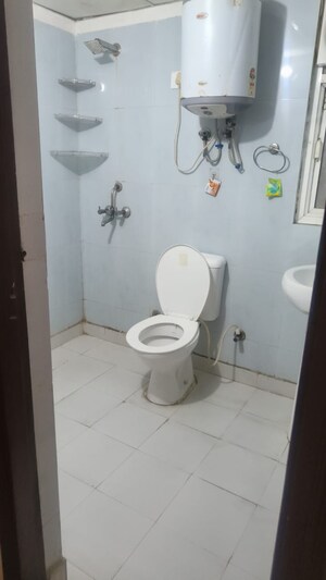 Bathroom in 3 BHK Apartment at Aims Golf City, Sector 75 – for Sale