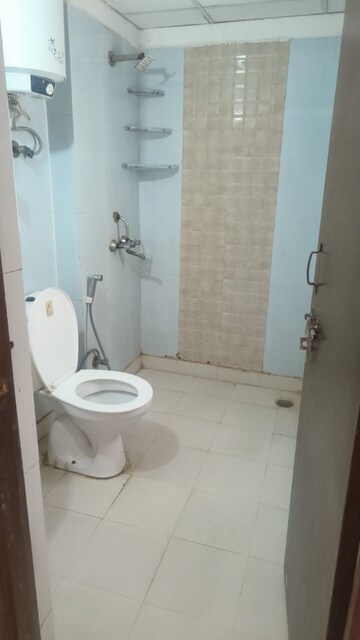 Bathroom in 3 BHK Apartment at Aims Golf City, Sector 75 – for Sale