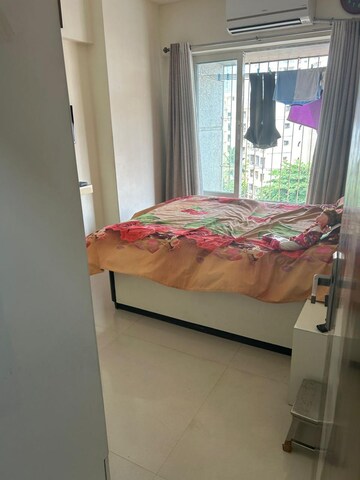 Bedroom in 2 BHK Apartment at Swapnalok Towers, Malad East – for Sale
