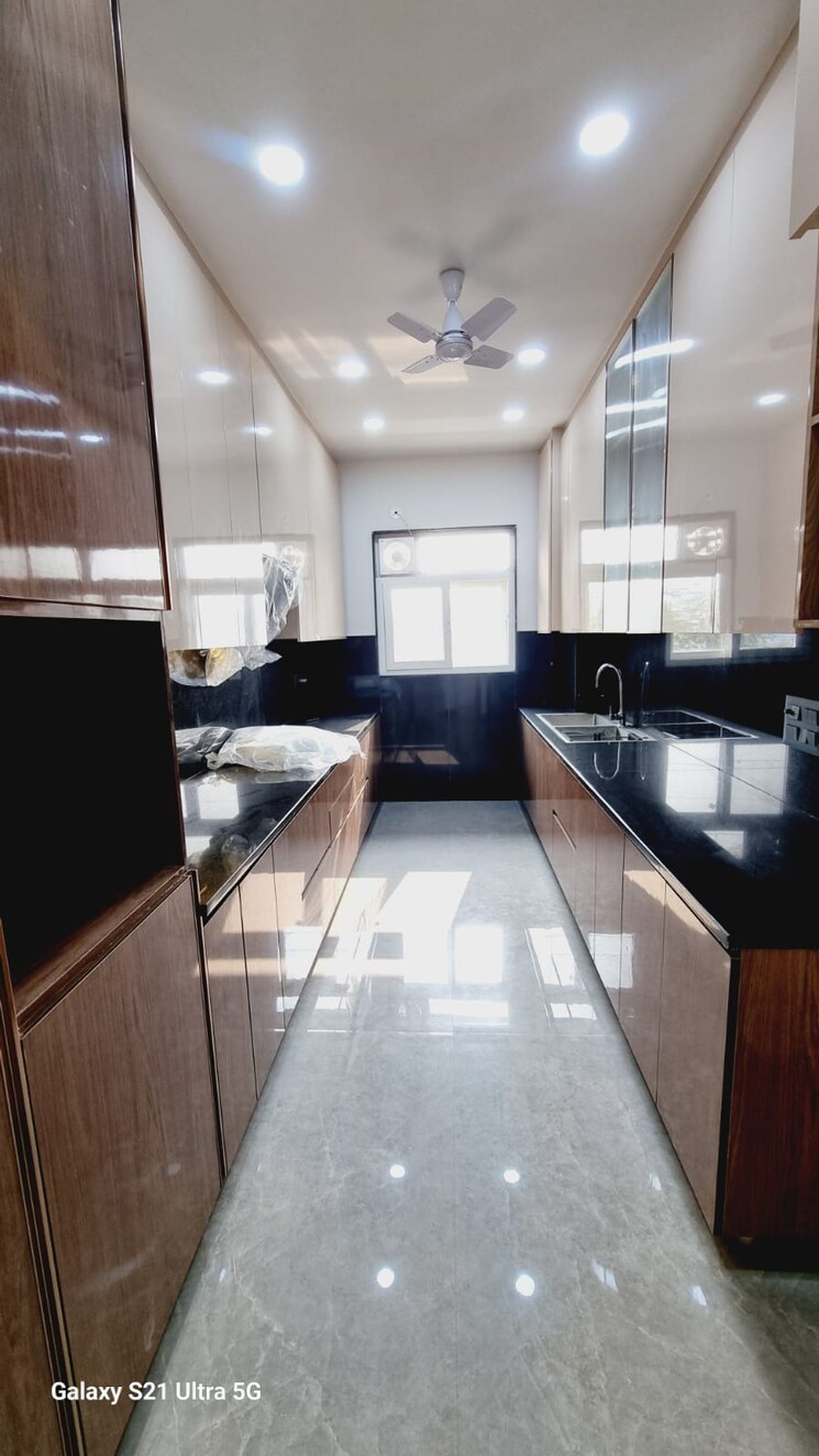 Kitchen, bptp-amstoria-country-floor 3 Bedroom 2025 Sq.Ft. Builder Floor In Sector 102 Gurgaon 8805487