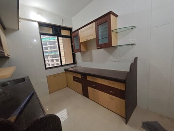 Kitchen in 3 BHK Apartment at Safal Shree Saraswati CHSL Plot 8 A, Chembur – for Rent