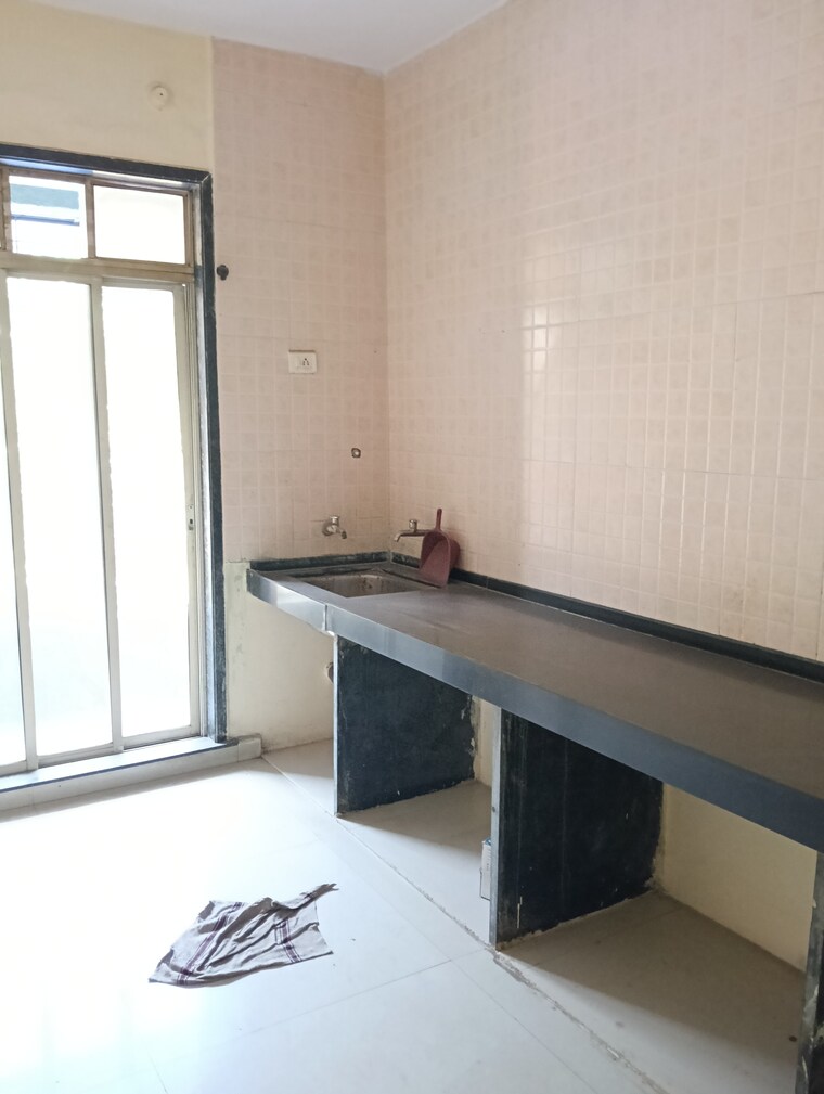 Kitchen, om-sai-paradise-dombivli-west 1 Bedroom 650 Sq.Ft. Apartment In Dombivli West Thane 8806084