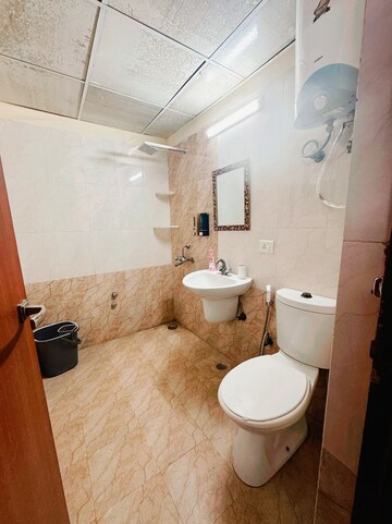 Bathroom in 2 BHK Apartment at Urbtech Xaviers, Sector 168 – for Rent