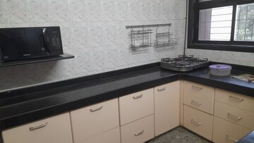 Kitchen in 2 BHK Apartment at Shubharambh Complex, Manpada – for Rent