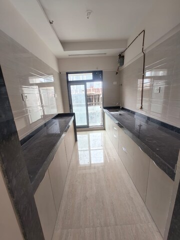 Kitchen in 3 BHK Apartment at Je And Vee Om Trimurti, Malad East – for Rent