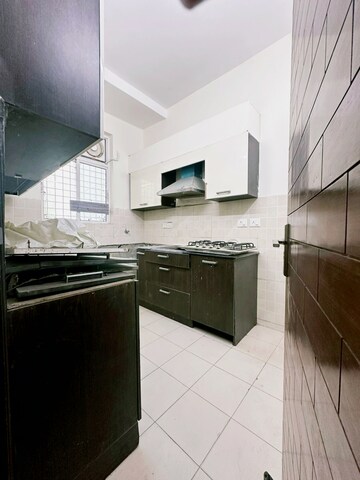 Kitchen in 2 BHK Apartment at Unitech Escape, Sector 50 – for Sale