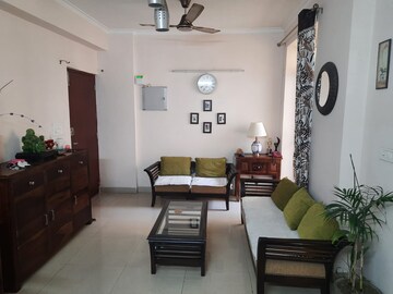 Living Room in 2 BHK Apartment at Logix Blossom County, Sector 137 – for Rent