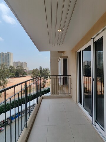 Balcony in 3 BHK Apartment at Bhartiya Nikoo Homes Phase 2, Thanisandra Main Road – for Rent