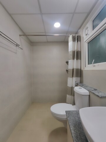 Bathroom in 3 BHK Apartment at Bhartiya Nikoo Homes Phase 2, Thanisandra Main Road – for Rent