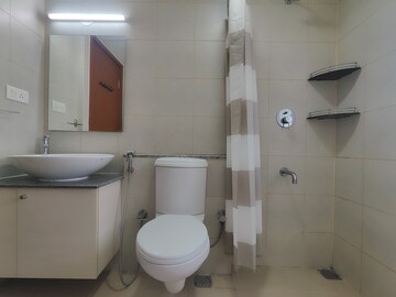 Bathroom in 3 BHK Apartment at Bhartiya Nikoo Homes Phase 2, Thanisandra Main Road – for Rent