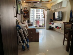 Living Room in 2 BHK Apartment at Rustomjee Avenue L1, Virar West – for Sale