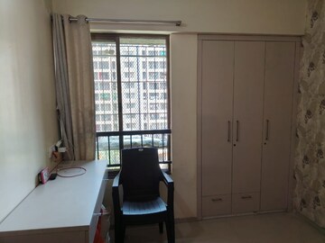 Living Room in 2 BHK Apartment at Rustomjee Avenue L1, Virar West – for Sale