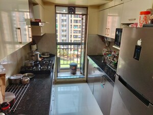 Living Room in 2 BHK Apartment at Rustomjee Avenue L1, Virar West – for Sale