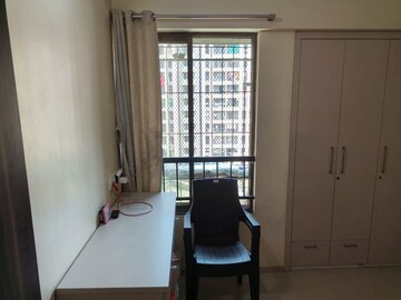 Living Room in 2 BHK Apartment at Rustomjee Avenue L1, Virar West – for Sale