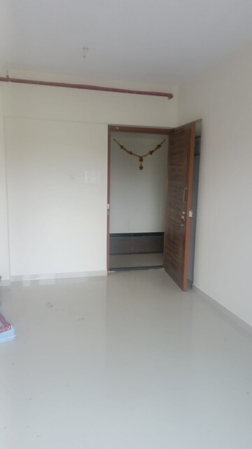 Living Room in 1 BHK Apartment at KM Horizon Exotica, Haware City – for Rent