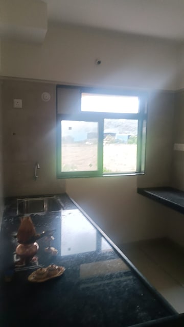 Kitchen in 1 BHK Apartment at KM Horizon Exotica, Haware City – for Rent