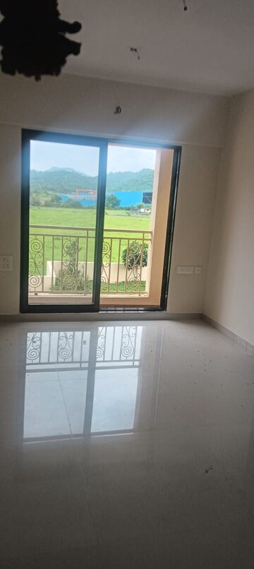 Living Room in 1 BHK Apartment at KM Horizon Exotica, Haware City – for Rent