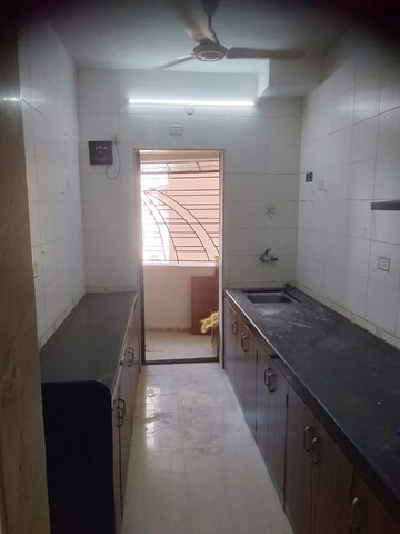 Kitchen in 2 BHK Apartment at Shiv Shrishti CHS, Powai – for Rent