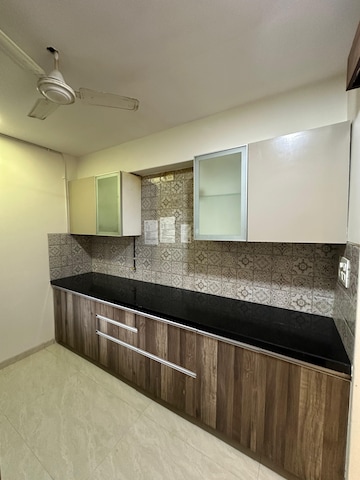 Kitchen in 2 BHK Apartment at Supreme 19, Lokhandwala – for Sale