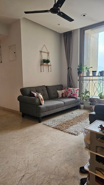Living Room in 2 BHK Apartment at One Hiranandani Park, Ghodbunder Road – for Sale