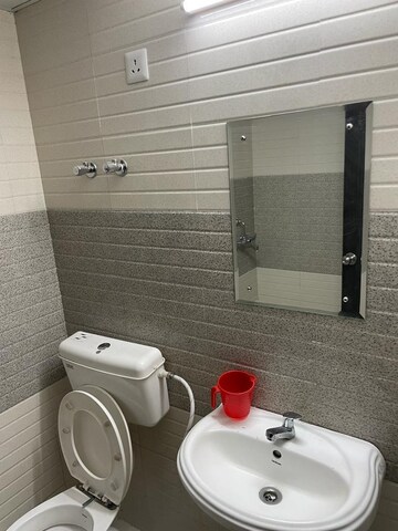 Bathroom in 2 BHK Apartment at Signature Global Orchard Avenue, Sector 93 – for Sale