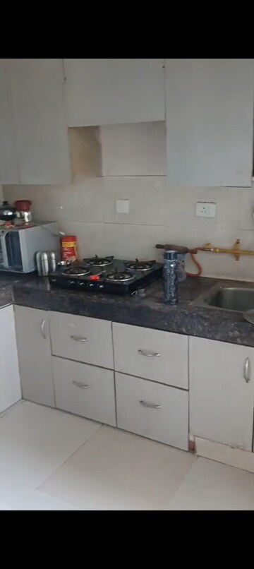 Kitchen in 2 BHK Apartment at JKG Palm Resort, Raj Nagar Extension – for Rent