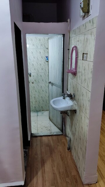 Bathroom in 1 BHK Apartment at Brahmand CHS, Brahmand – for Rent