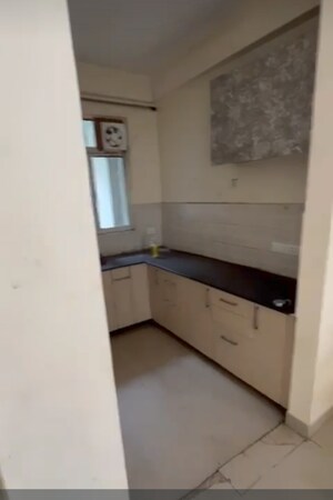 Kitchen in 1 BHK Apartment at SCC Heights, Raj Nagar Extension – for Sale