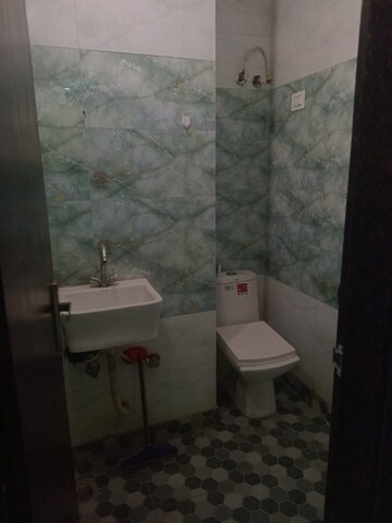 Bathroom in 2.5 BHK Builder Floor at Dwarka Mor – for Rent