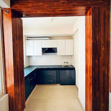 Kitchen in 2 BHK Apartment at Shree Vardhman Green Court, Sector 90 – for Rent