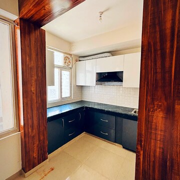 Kitchen in 2 BHK Apartment at Shree Vardhman Green Court, Sector 90 – for Rent