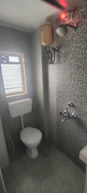 Bathroom in 1 BHK Apartment at Veera Desai Road – for Rent