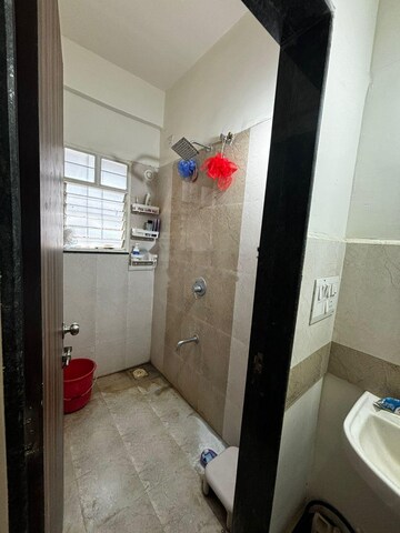 Bathroom in 1 BHK Apartment at PGD Pinnacle, Mundhwa – for Rent