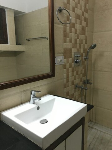 Bathroom in 3 BHK Builder Floor at Green Park – for Rent