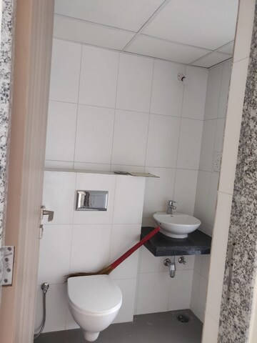 Bathroom in 1 BHK Apartment at Godrej Nirvaan, Themghar – for Rent