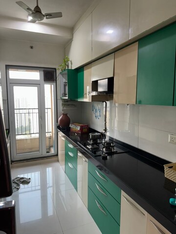 Kitchen in 3 BHK Apartment at Rustomjee Urbania Azziano, Thane West – for Rent