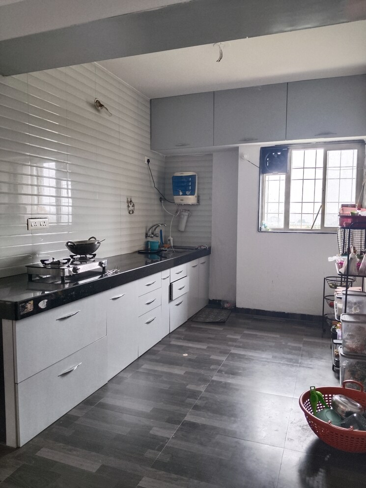 Kitchen, nimhan-onella-nest-phase-i 2 Bedroom 979 Sq.Ft. Apartment In Sus Pune 8807825