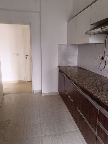 Kitchen in 3 BHK Apartment at DLF Regal Gardens, Sector 90 – for Rent
